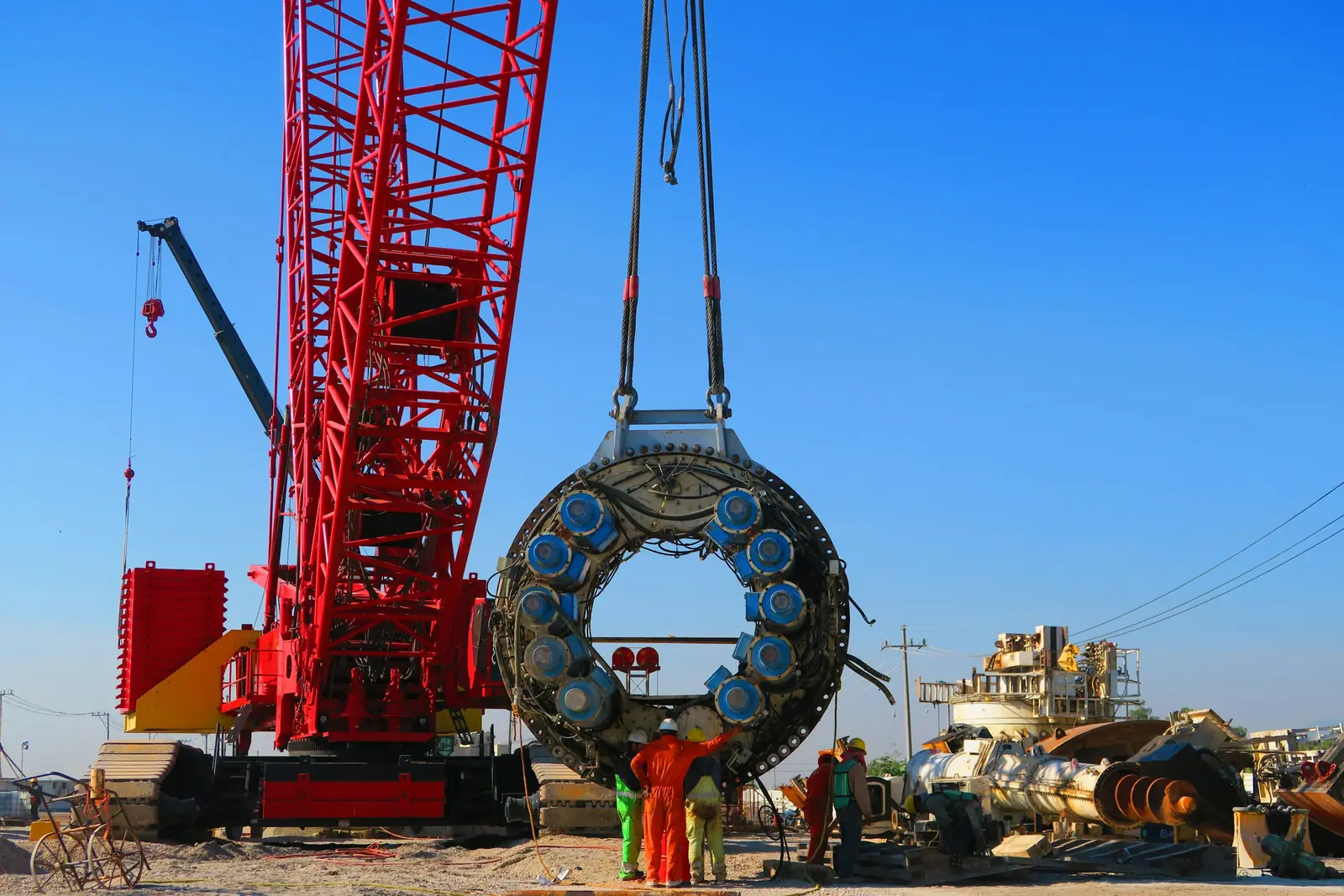Crawler crane lifting a heavy industrial component on site